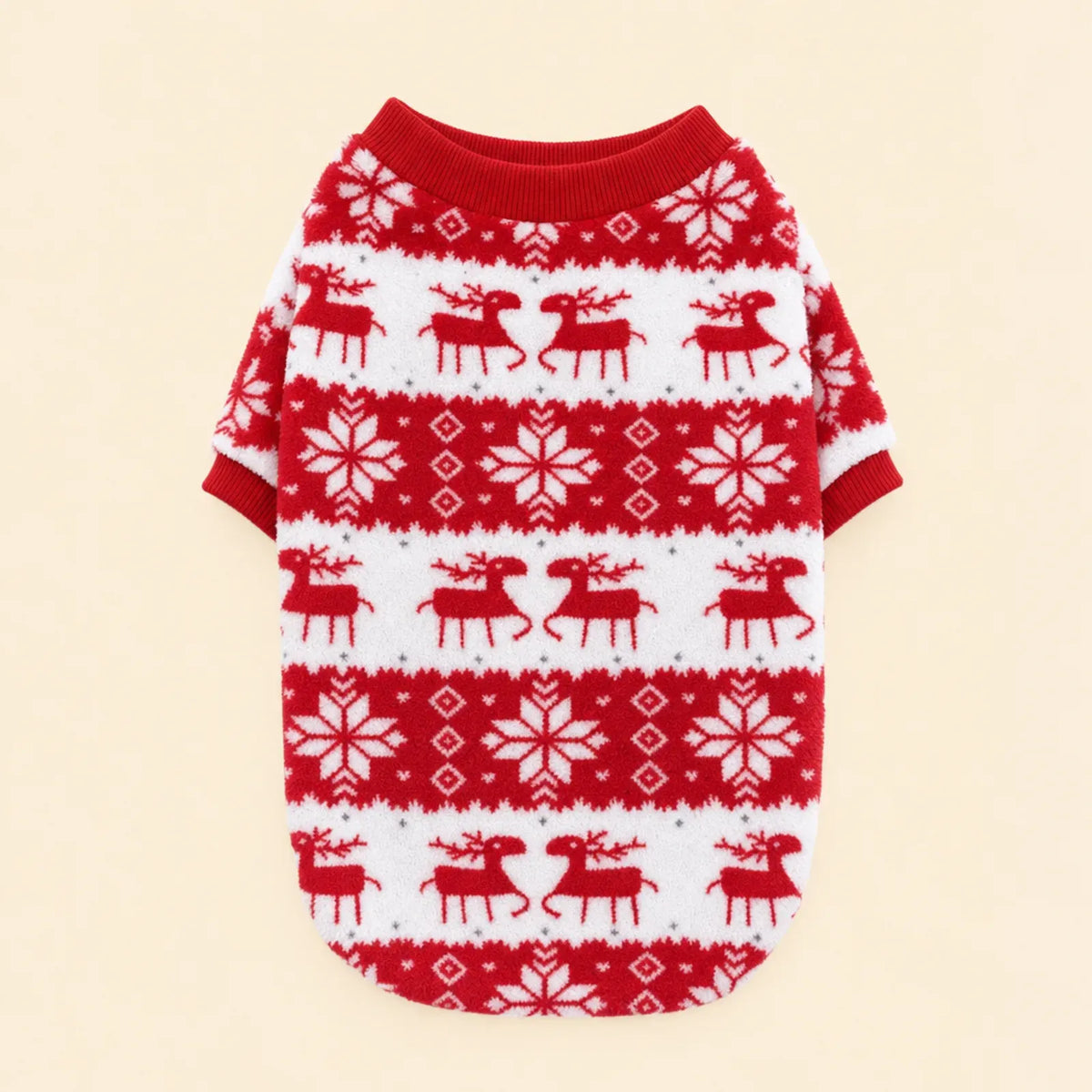 Red and white padded dog sweater with reindeer and snowflake bands and a red ribbed collar and cuffs, laid flat